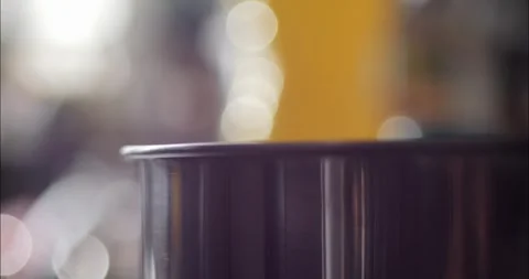 Steaming pan on top of the kitchen stove 4K panning video Stock Footage 298839470