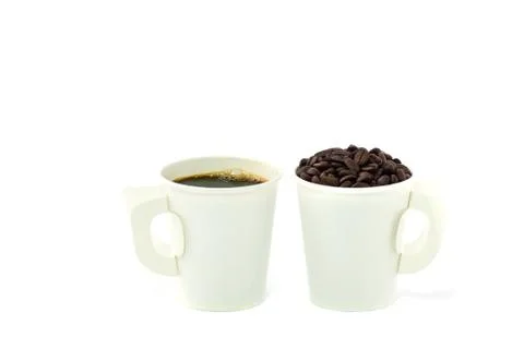 Steaming  paper coffee cup with beans on white background Stock Photos