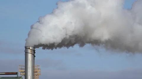 Steaming Pipe on Blue Sky Background Stock Footage 60050893
