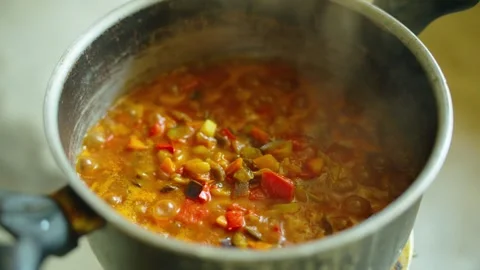 A steaming pot of stewed vegetables Stock Footage 314637978