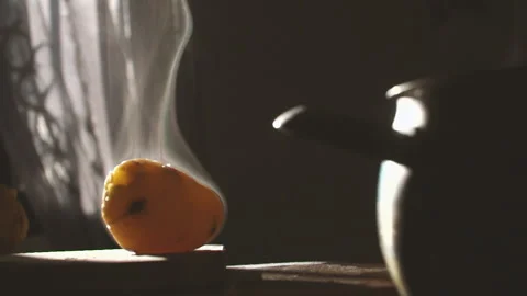 Steaming potato in backlight upward 200fps Stock Footage 151848602