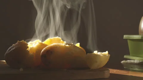 Steaming potatos in backlight still 200fps Stock Footage 151849656