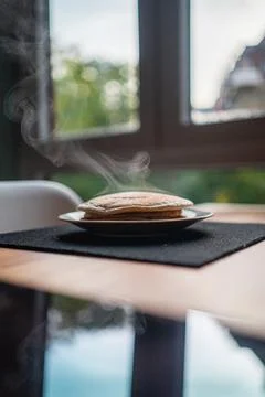 Steaming Soft Pancakes on a Table for Breakfast Stock Photos