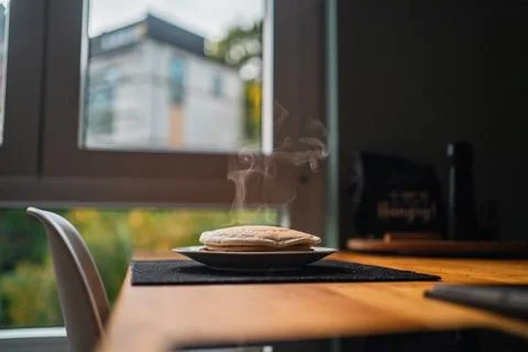 Steaming Stack of Delicious Homemade Pancakes Sitting on a Wooden Table Stock Photos