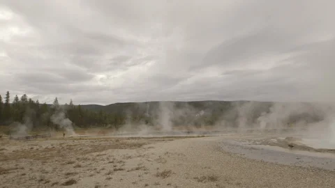 Steaming Sulfuric Hot Spring with Rising Stream in Yellowstone Nation Stock Footage 122224124
