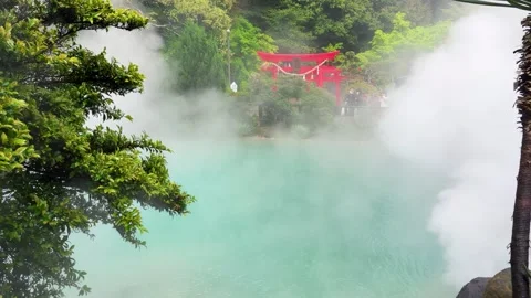 Steaming turquoise thermal hot spring Umi Jigoku in Beppu Japan 스톡 동영상 334581477