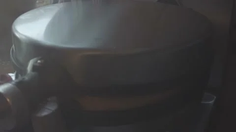 Steaming waffle iron opens to show fresh waffle Stock Footage 169354089