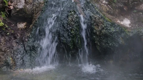 Steaming Water Running Down Rocks in Hot Springs National Park Stock Footage 106354576
