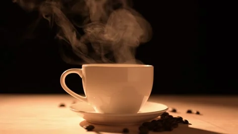 Steaming White Coffee Cup with Beans Stock Footage 294966150