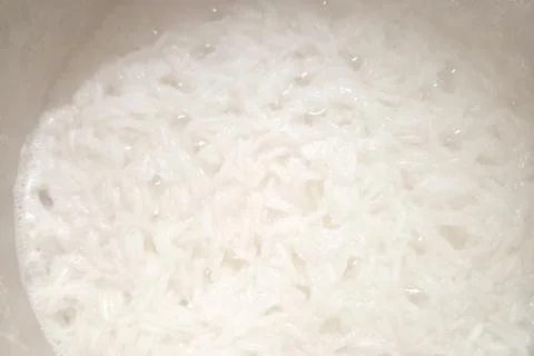 Steaming White Rice Cooking Process for Culinary and Food Presentation Design Stock Photos