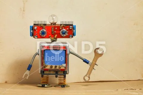 Steampunk machinery robot, smiley red head, blue monitor body. Handyman Stock Photos