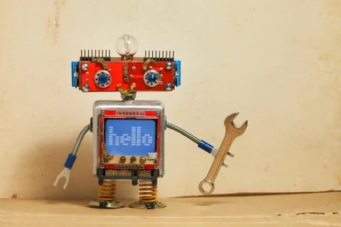 Steampunk machinery robot, smiley red head, blue monitor body. Handyman Stock Photos