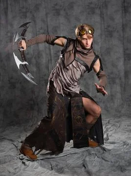 Steampunk or post-apocalyptic style character, with an unusual cold weapon Foto stock