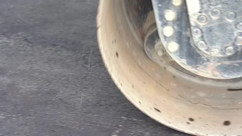 Steamroller compact flatten out the asphalt tar Stock Footage 138860829