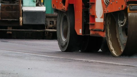 Steamroller levels highway surface Video stock 194835006