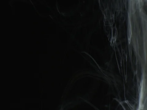 Steam(smoke) rise motion on black background. VFX element Stock Footage