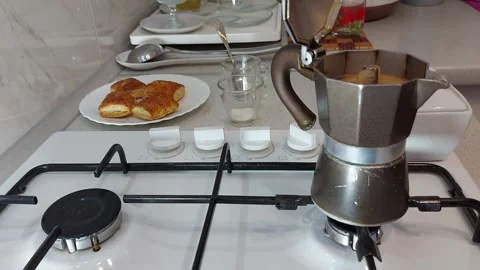 Steamy Coffee Chaos. Boiling Sputtering Stock-Footage 303414386