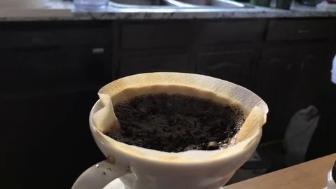 Steamy coffee on the filter Stock Footage 122051771