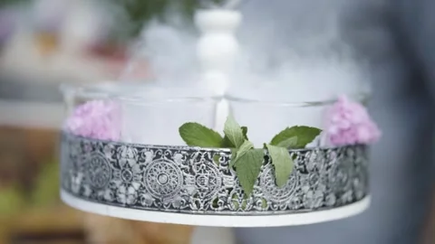 Steamy Drinks on a Decorated Platform Stock Footage 300487320