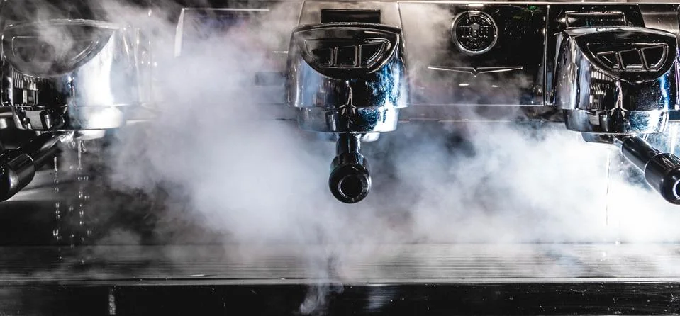 Steamy espresso machine Stock Photos
