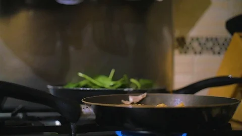 Steamy Frying Pan Slow Motion 7 Stock Footage 100863909