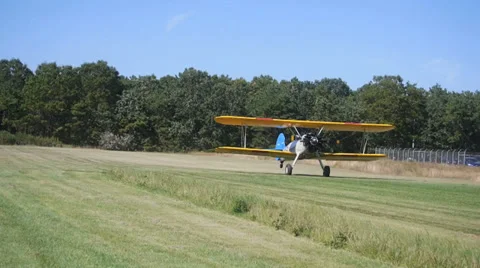 STEARMAN BI PLANE TAKING OFF Stock Footage 29993635
