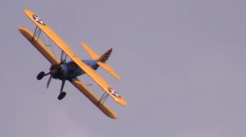 Stearman Biplane Low Right Turn Over Ground 動画素材 64383489