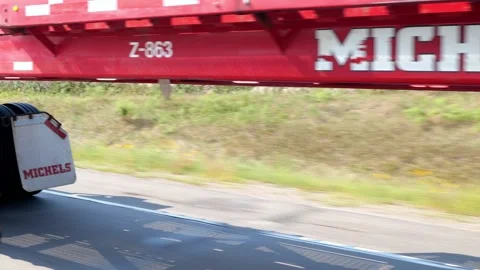 STEARNS CO, MN - 17 AUG 2021: Semi truck and trailer driving on highway. Stock Footage 162359947