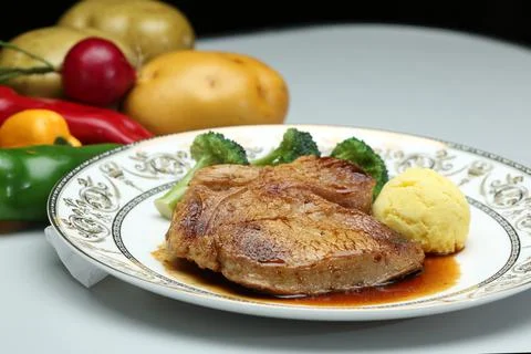 The steck set with vegetable in white plate Stock Photos