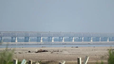 Steel bridge over river with sandy landscape Stock Footage 331277553