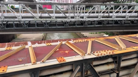 Steel Bridge Truss pipeline Structure over Urban River Canal 库存影片 342889970