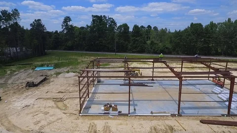 Steel Building Construction Framework Drone Shot 3 Stock Footage 99567539