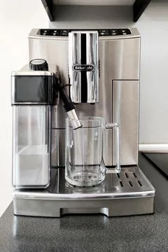 Steel-colored coffee machine for making different types of coffee with glass Stock Photos