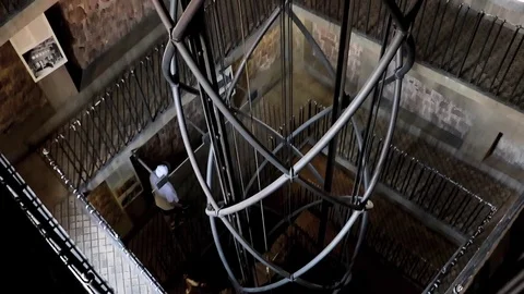 Steel construction for elevator inside the Old Town Hall Tower, Prague Stock Footage 71884595