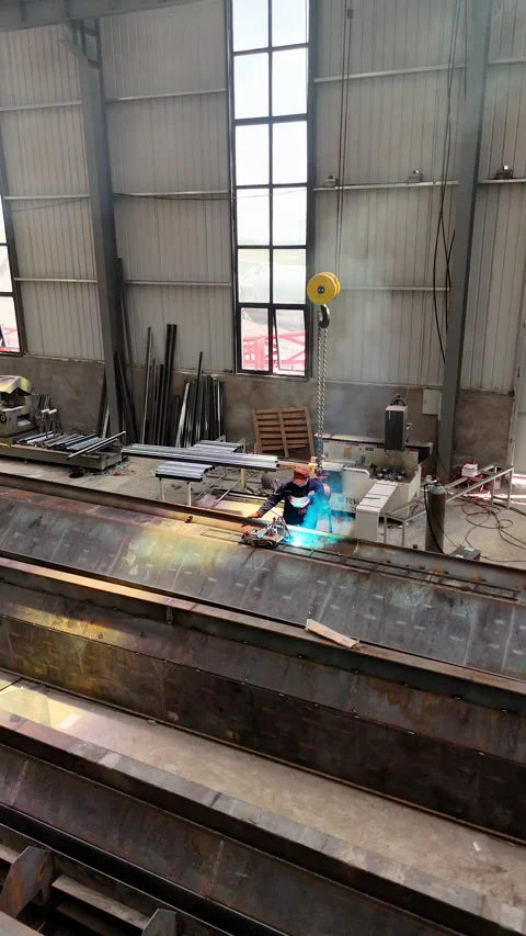 Steel fabrication process inside industrial workshop Stock Footage 335795047