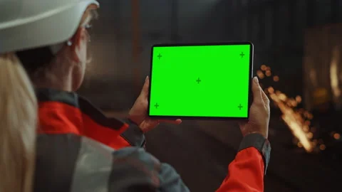 Steel Factory Industrial Engineer Using Tablet with Green Screen Video stock 140594779