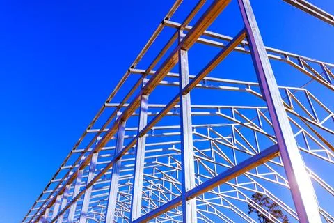 Steel frame beams structure at construction site Stock Photos