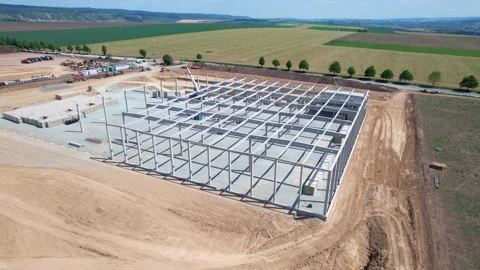 Steel frame structure. In the construction site, steel structure is under Stock Footage 196861639