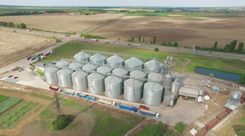 Steel grain silos elevators storage 4k aerial video. Agriculture industry Stock Footage 67319802