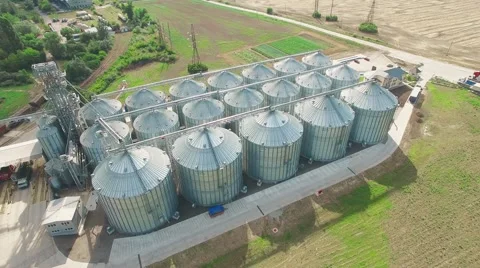 Steel grain silos elevators storage 4k aerial video. Agriculture industry Stock Footage 67320457