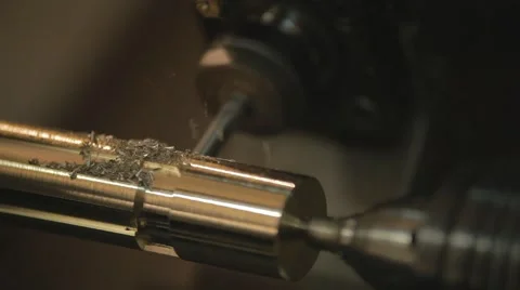 Steel metal cutting machine process by CNC lathe in workshop Stock Footage 64990553