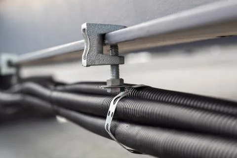 Steel mount for installation of engineering networks. Stock Photos