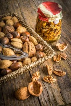 Steel nutcracker and nuts Fotos Stock