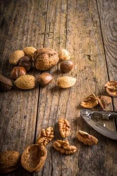 Steel nutcracker and nuts Stock Photos