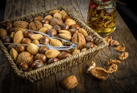Steel nutcracker and nuts Stock Photos