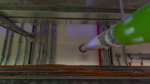 Steel pipe management for network or electric cable with metal flex pipe or Stock Footage 173418699