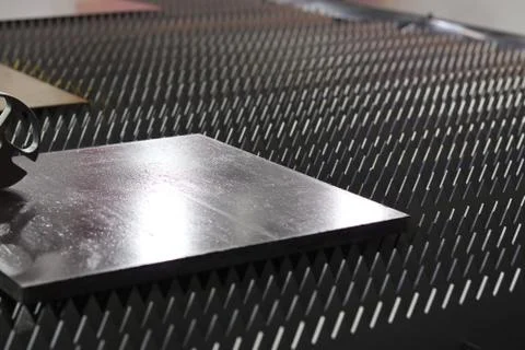 A steel plate on machine , ready for processing Stock Photos