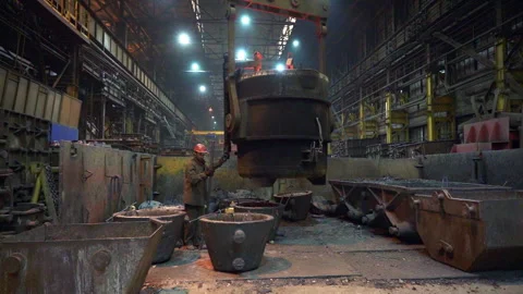 Steel production in an industrial foundry involves complex stages and techniques Stock Footage 284160176