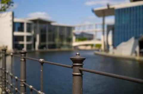 Steel railing by the river Stock Photos