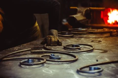 Steel rods and objects on a table, summer medieval fair, Streatham, London Stock Photos